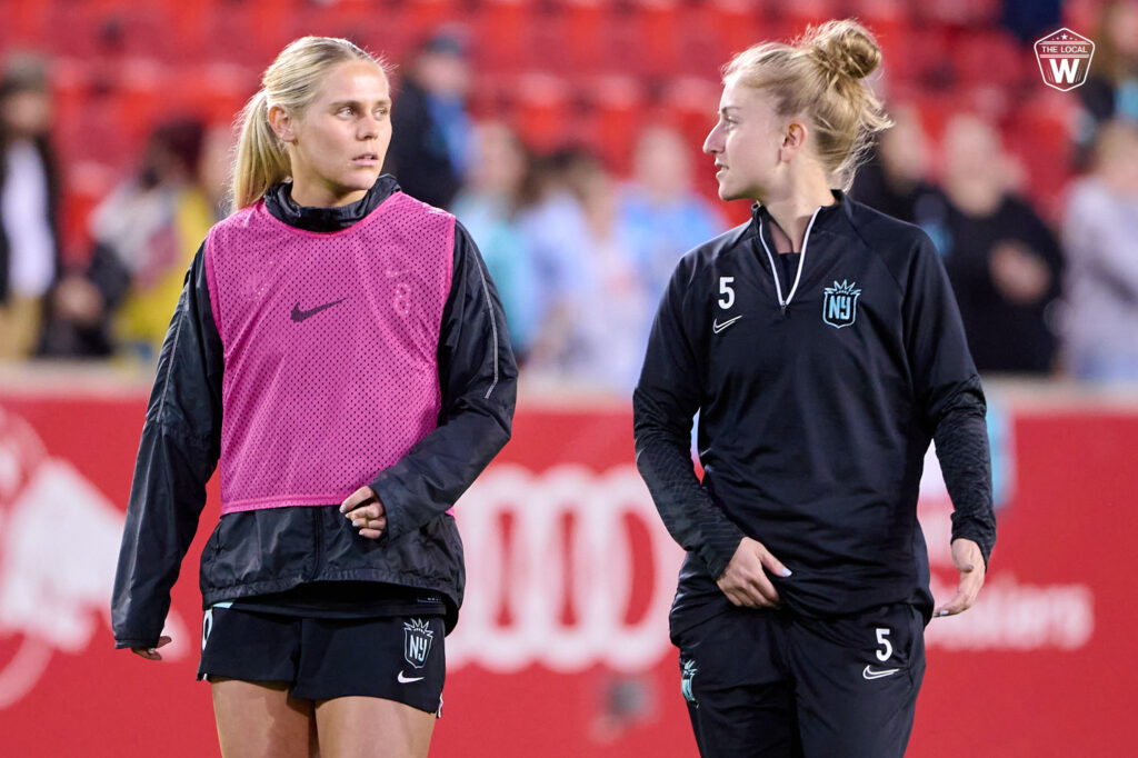 Taryn Torres talks with Gotham FC teammate Nicole Baxter after the team’s final 2022 NWSL Challenge Cup game.