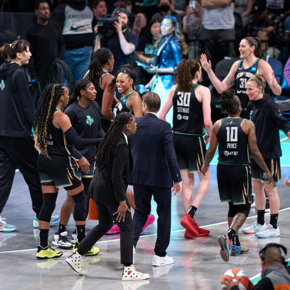 The New York Liberty celebrate a successful victory