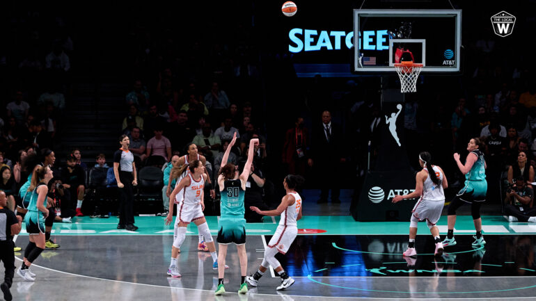 Breanna Stewart shooting a 3