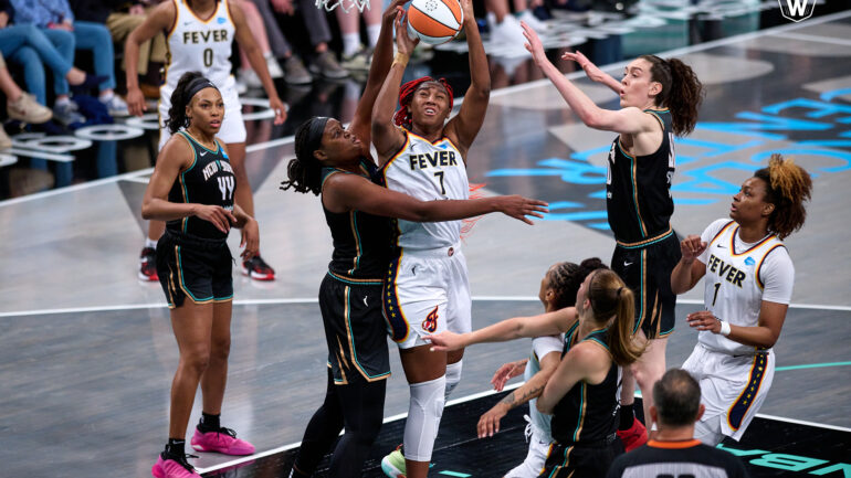 Aliyah Boston battles the NY Liberty in the paint.