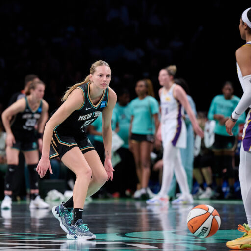 Marine Johannes plays defense in WNBA game.