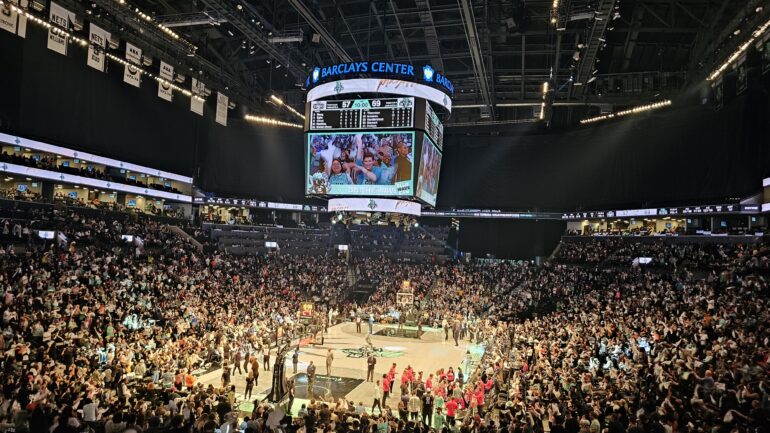 NY Liberty fans celebrate in the fourth quarter.