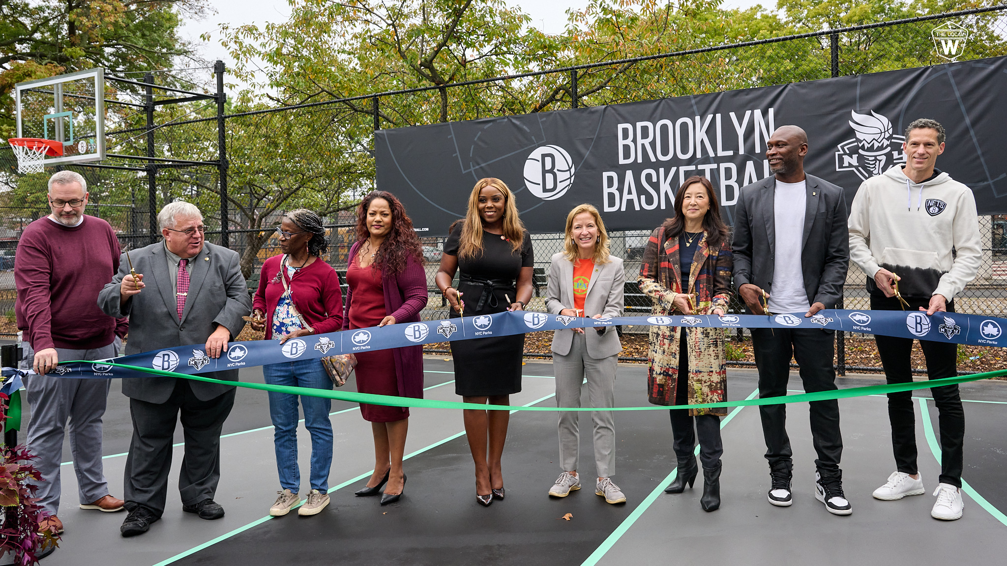 NY Liberty and Brooklyn Nets owner Clara Wu Tsai with Brooklyn officials