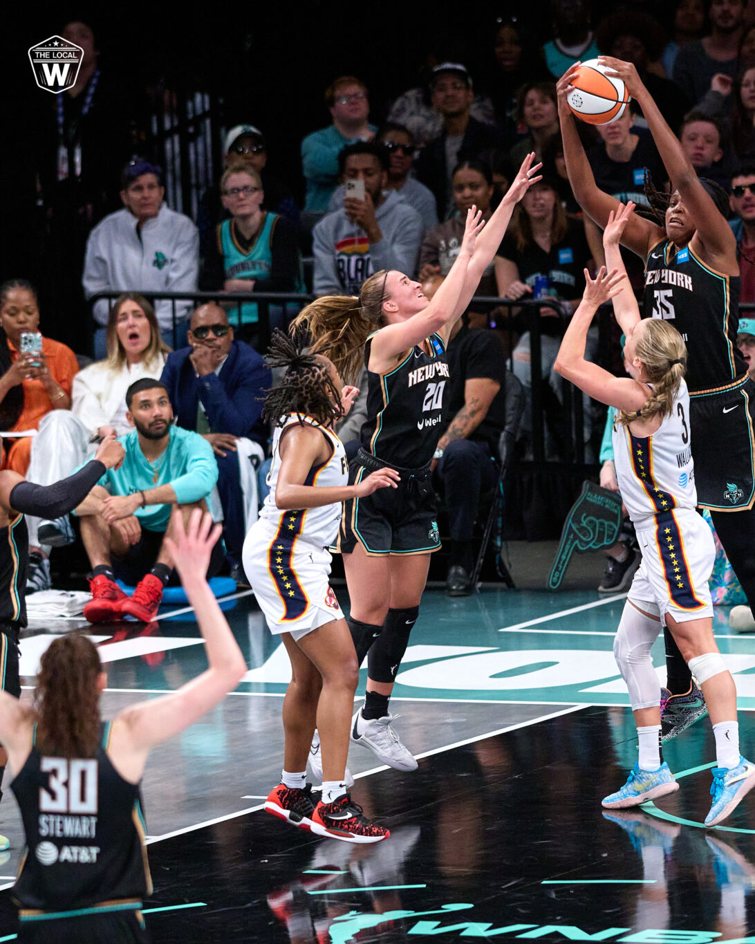 NY Liberty center Jonquel Jones grabbing a contested rebound