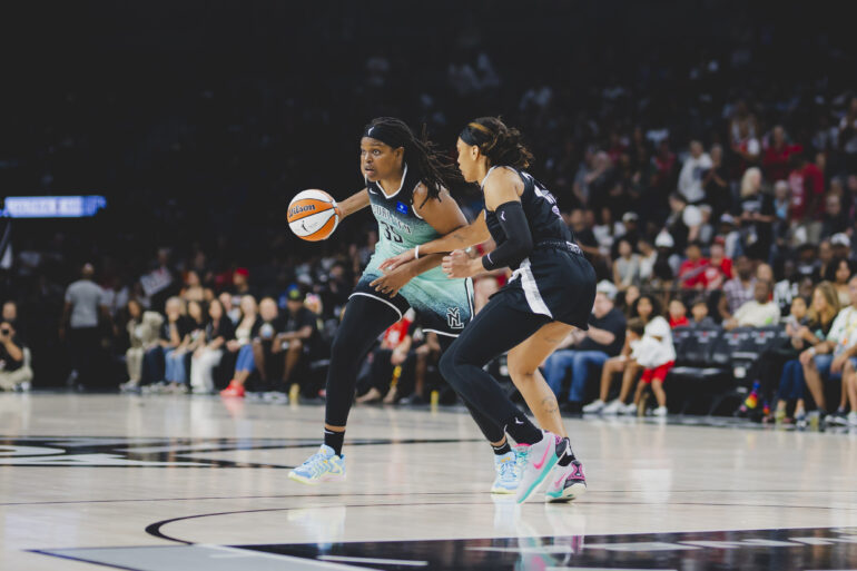 Jonquel Jones of the Liberty and A'ja Wilson of the Aces