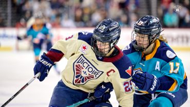 Marie-Philip Poulin and Ella Shelton